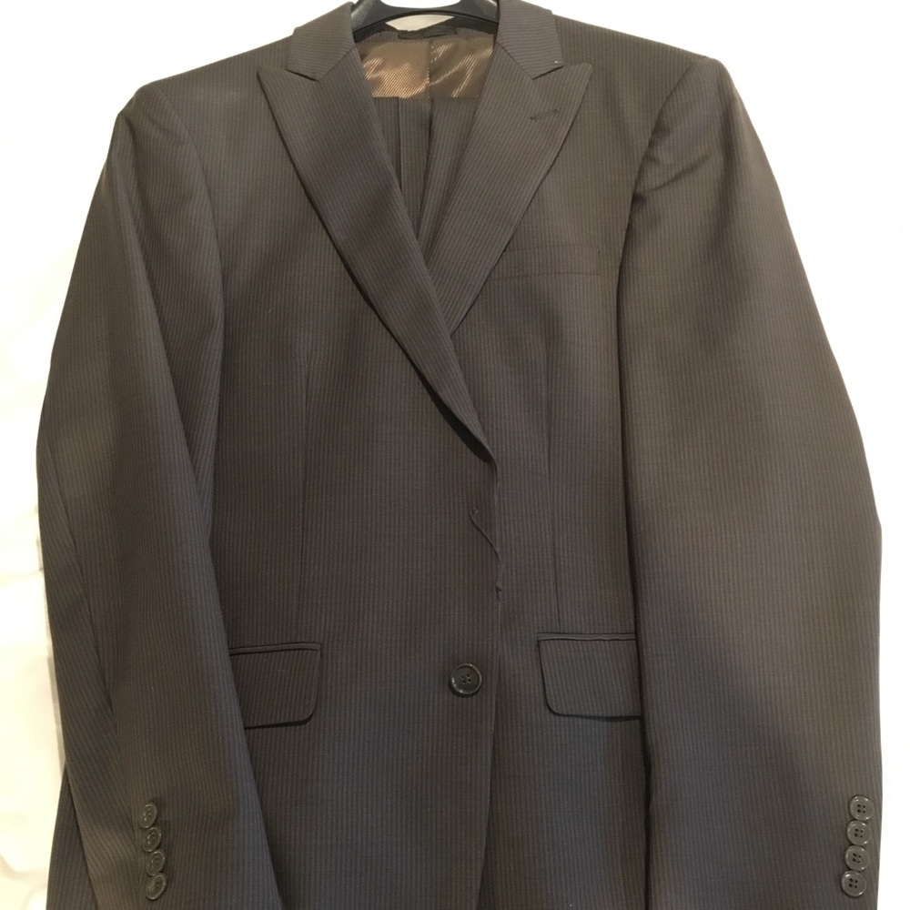 Men’s Warehouse “olive” pinstripe suit.